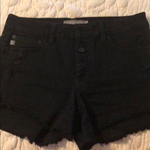 Button fly black jean shorts